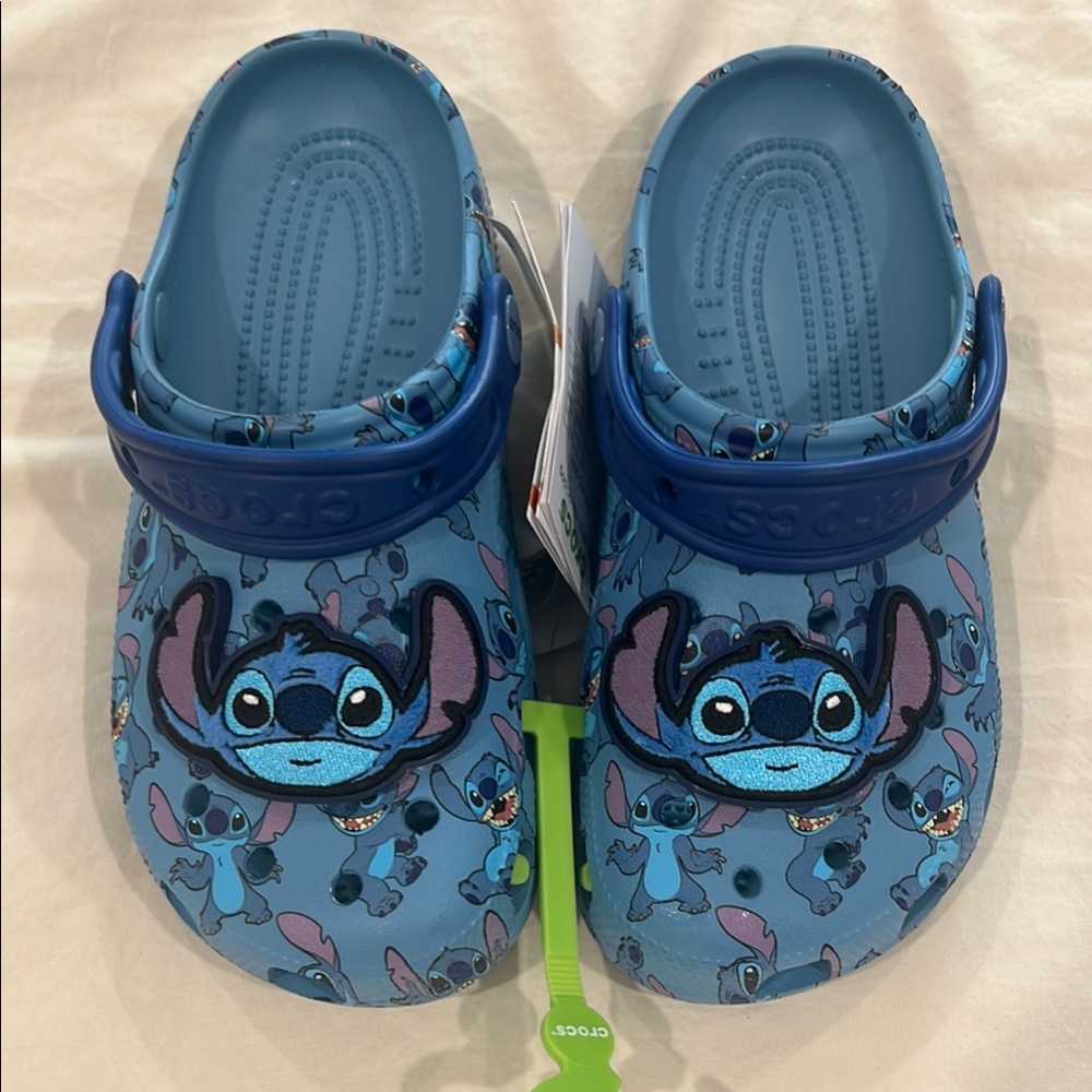 CROCS Blue Slippers with Playful Stitch Design